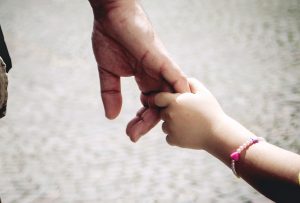 Hands: dad and daughter